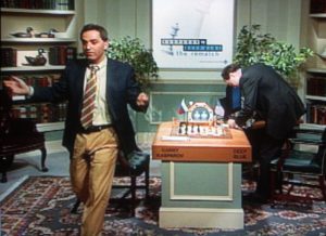 Garry Kasparov, left, gives up in defeat against IBM's chess playing computer.